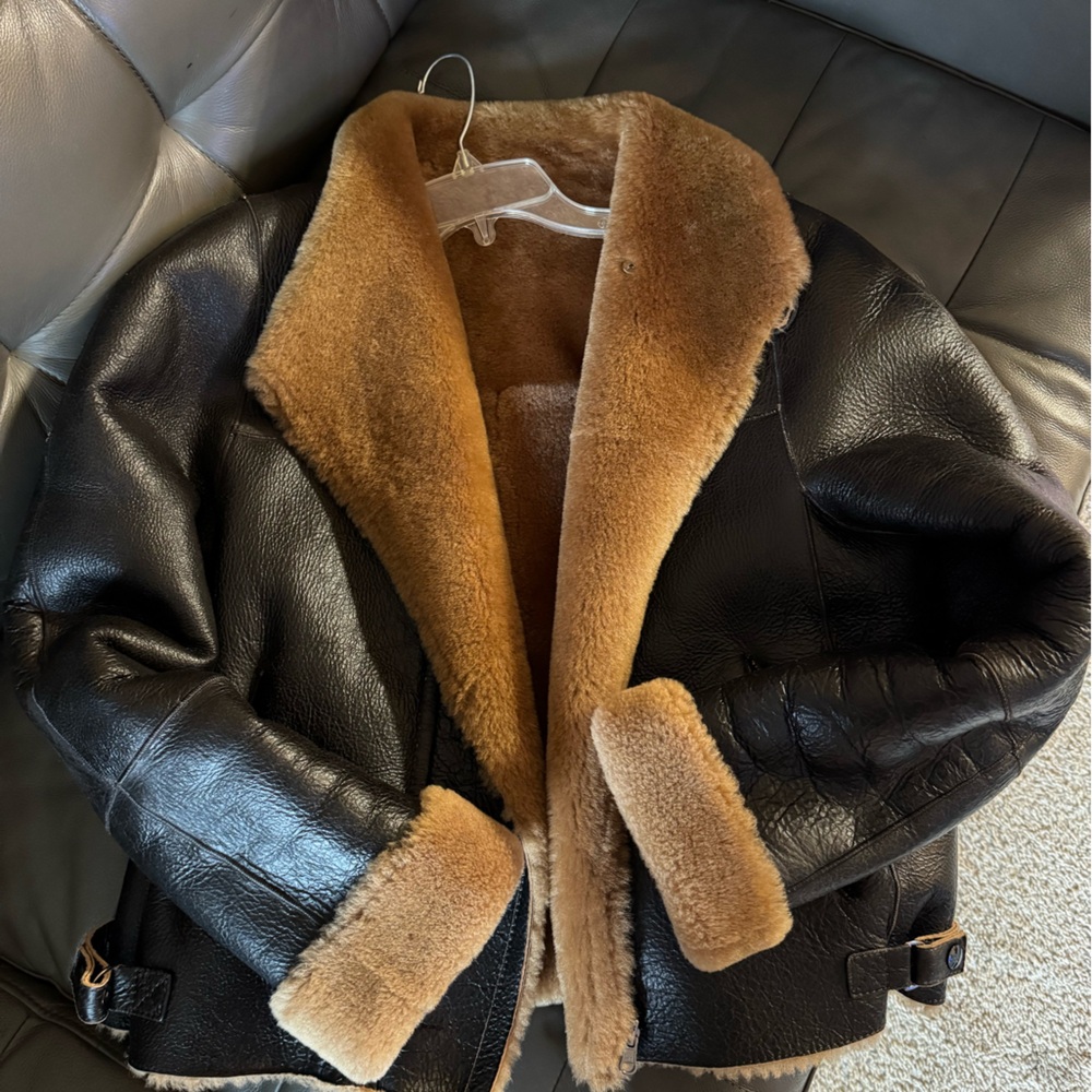Elegant Black and Tan Shearling Leather Jacket